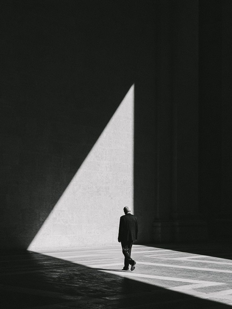 Solitary Figure in Light Photography Poster. poster — photography art