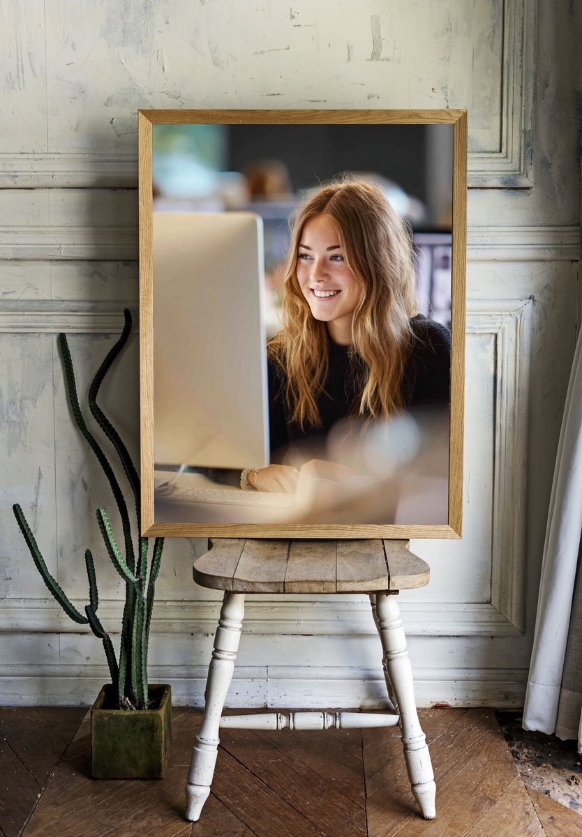 Smiling Woman at Desk Photography Poster. — room view 1