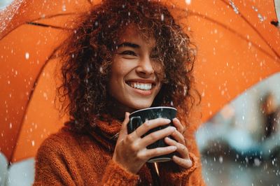 Smiling Woman in Rain Photography Poster. poster print