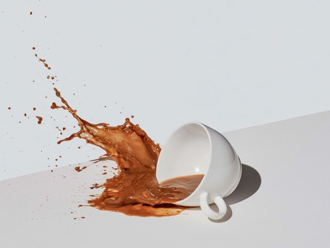 Spilled Coffee Cup Photography Poster. poster detail