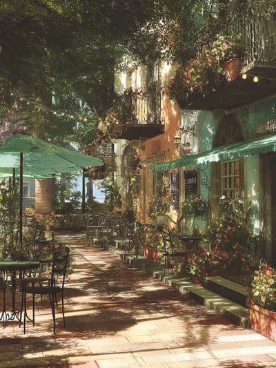 Sunlit Courtyard Café Photography Poster. poster