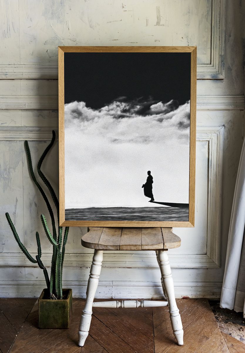 Solitary Figure in Clouds Photography Poster. — room view 1