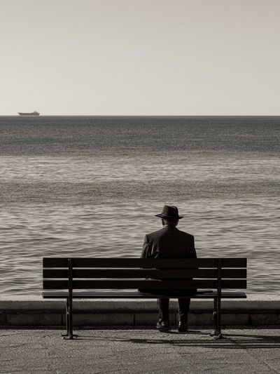 Solitary Seaside Bench Photography Poster. poster
