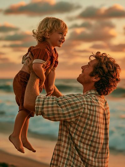 Sunset Beach Father and Child Poster.