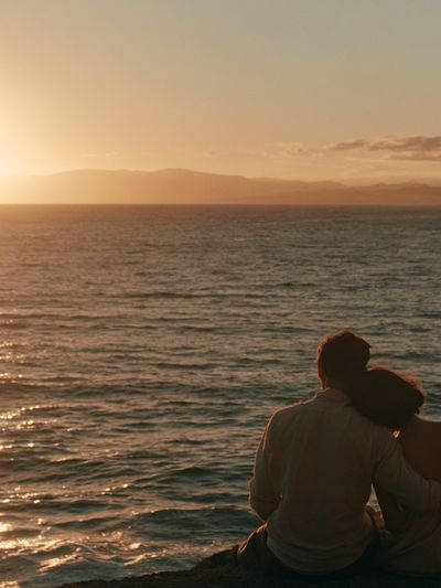 Sunset Couple by the Sea Photography Poster.