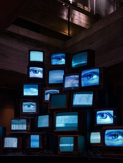 Surveillance TV Stack Photography Poster. poster print