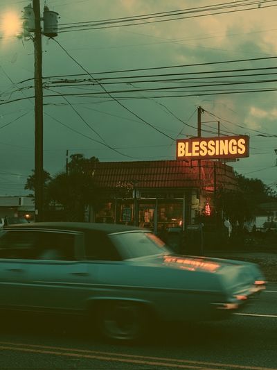 Blessings Neon Street Scene Poster. poster