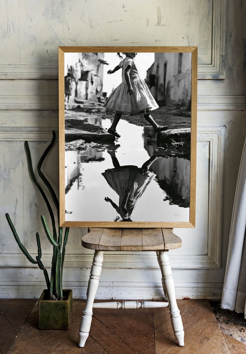 Girl Crossing Puddle Photography Poster. room preview