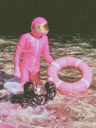 Pink Astronaut Rescue Photography Poster.