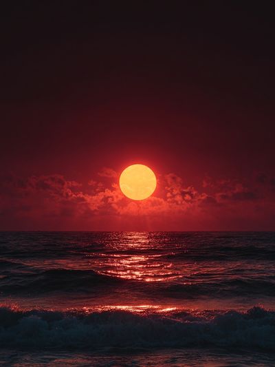 Crimson Ocean Sunset Photography Poster. poster