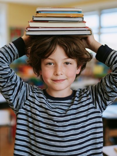 Boy with Books Photography Poster. poster