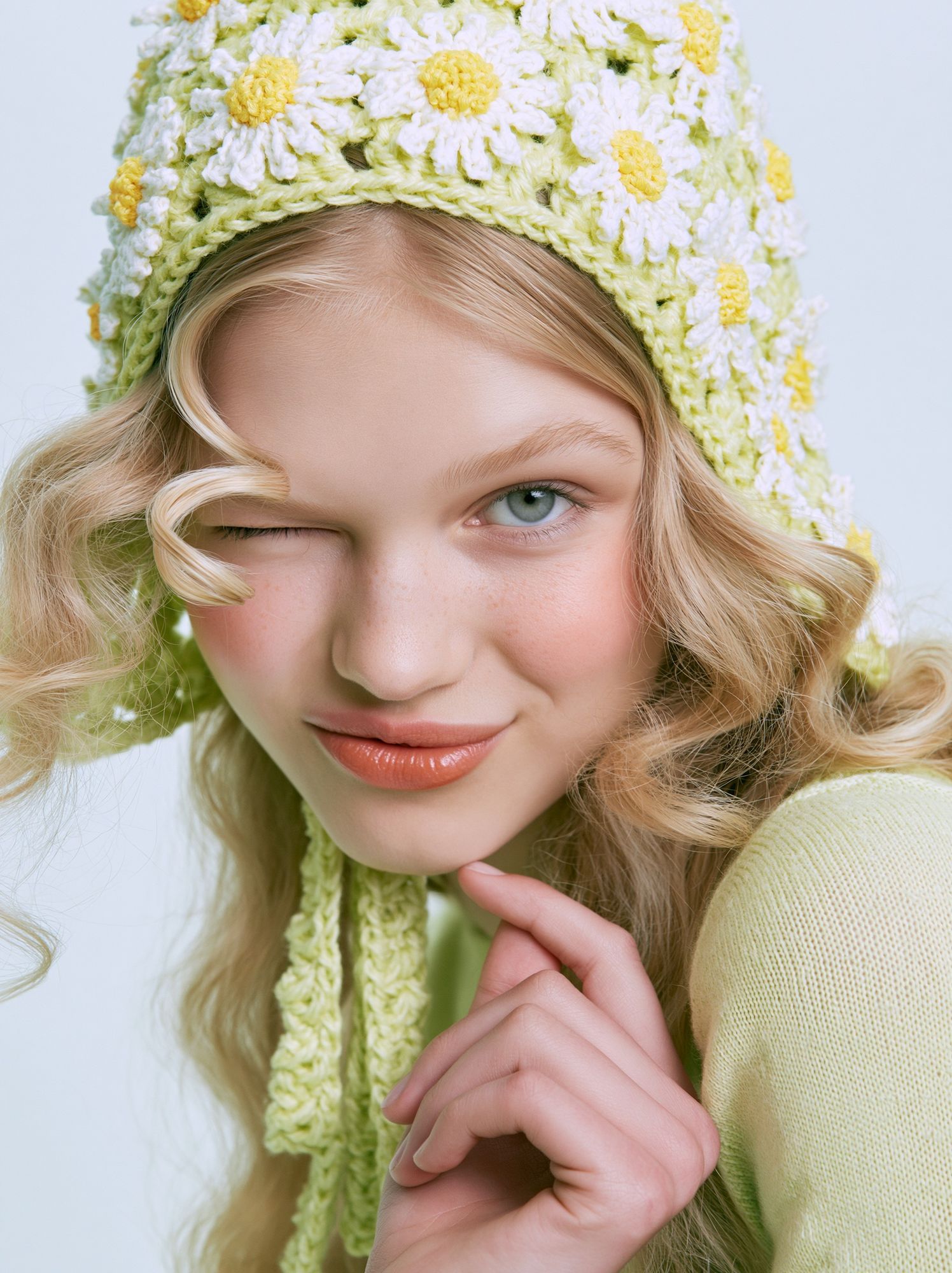 Blonde Portrait in Daisy Knit Poster. poster detail