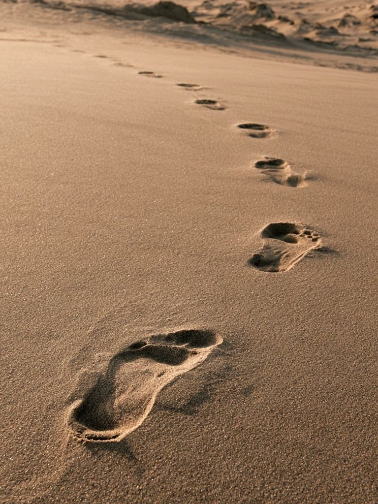 Footprints on Sand Photography Poster. poster detail