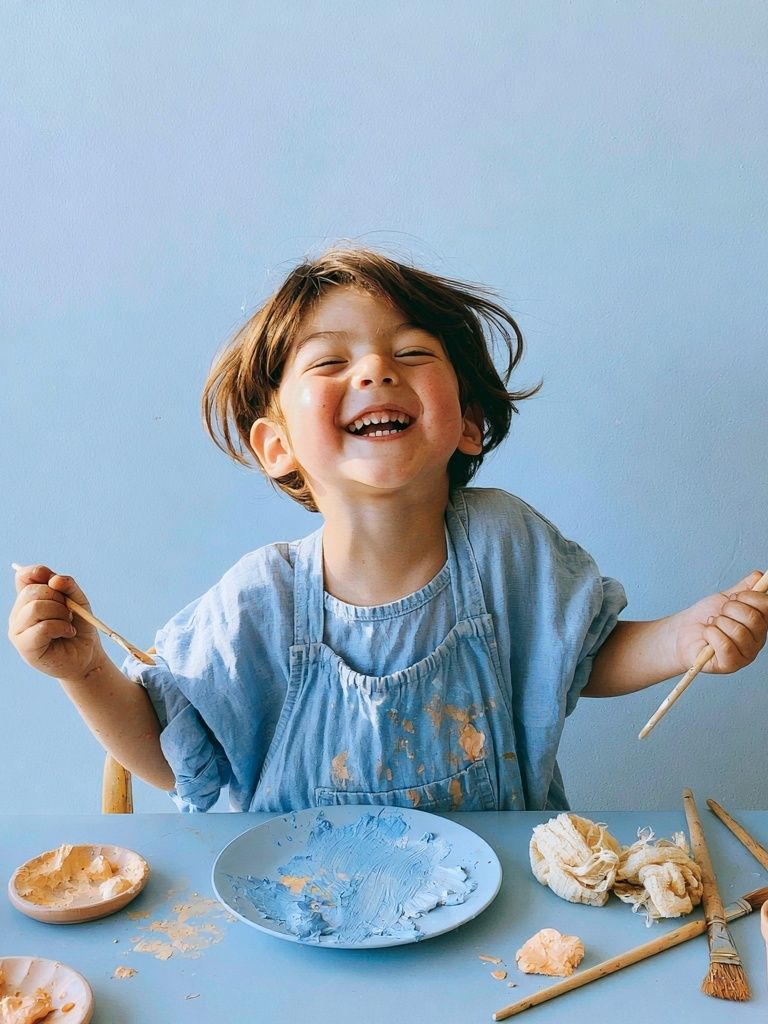 Joyful Child Painting Portrait Poster. poster detail