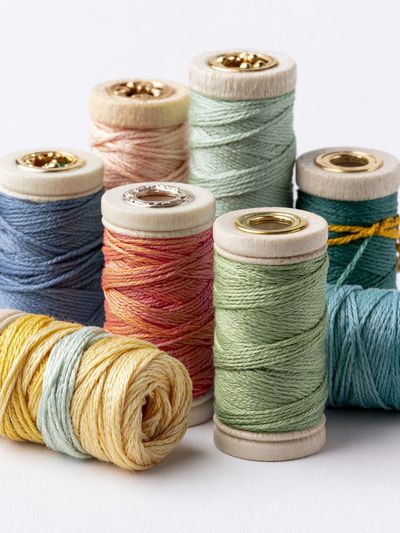 Pastel Thread Spools Photography Poster. poster