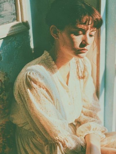Sunlit Woman Portrait Print. poster