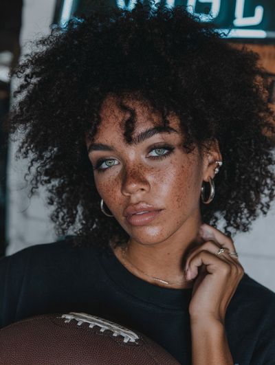 Freckled Portrait with Football Print.