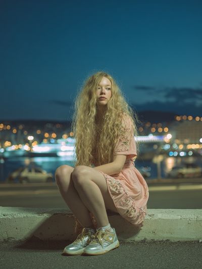 Young Woman at Dusk — Photography Print. poster