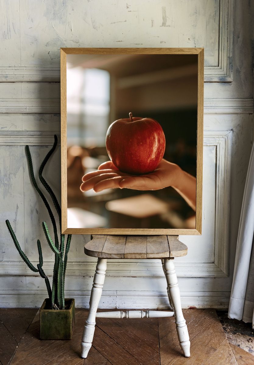 Red Apple in Hand Photography Poster. — room view 1