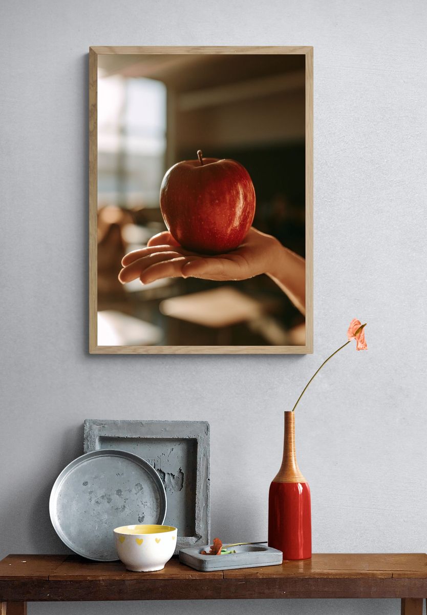 Red Apple in Hand Photography Poster. — room view 3