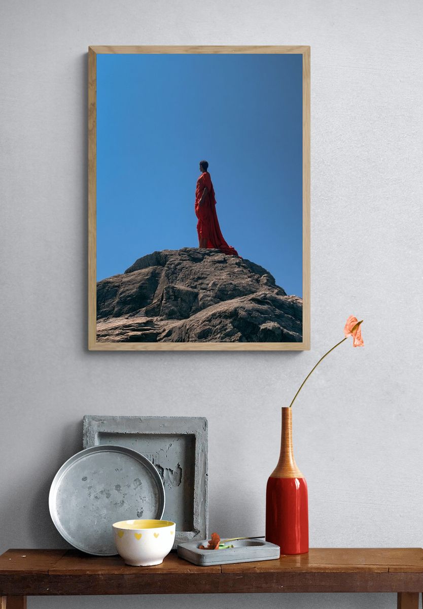 Red Figure on Rock Photography Poster. — room view 3