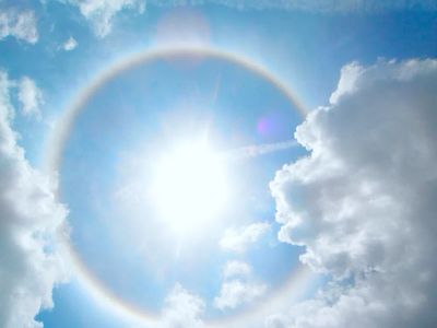Sun Halo in Blue Sky — Photography Print. poster