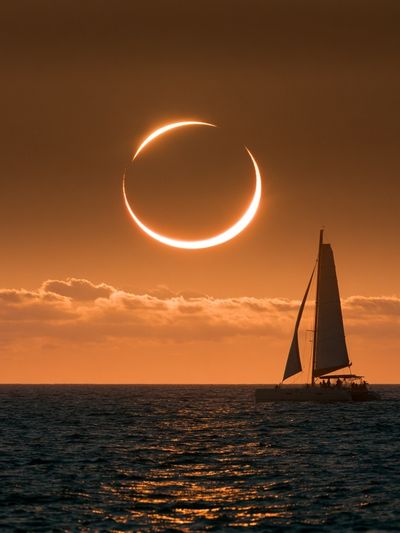 Solar Eclipse Sailboat Photography Poster. poster
