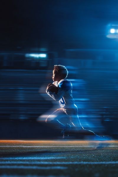 Youth Football Player — Sports Photography Print. poster