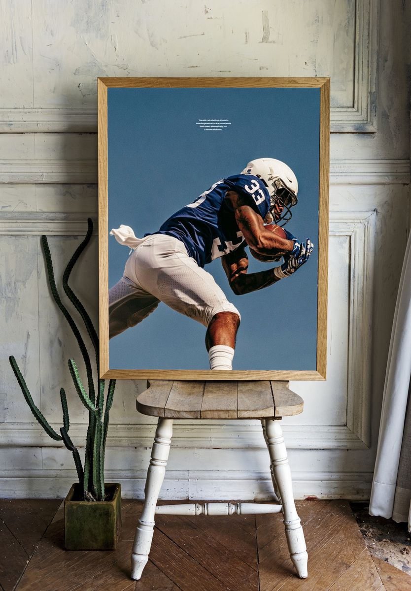 Football Catch Action Photography Poster. — room view 1