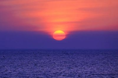Serene Sunset Over Ocean — Nature Print. poster