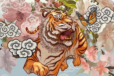 Tiger butterfly amid cherry blossom