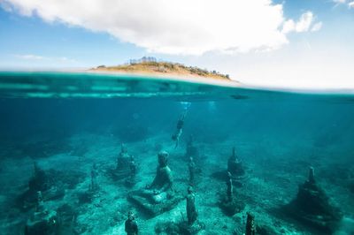 Underwater Buddha Statues — Photography Print. poster
