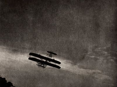 Vintage Biplane in Flight — Black-White Print. poster