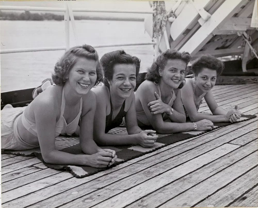 Sunbathing is popular pursuit off-duty. poster — photography art
