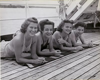 Sunbathing is popular pursuit off-duty. poster