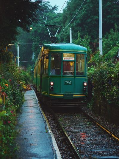 Vintage Tram in Rainy Street Poster.
