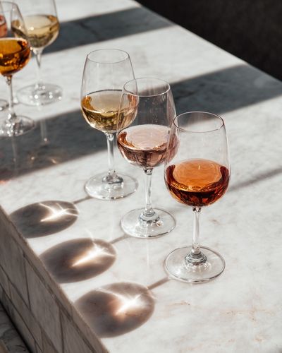 Wine Glasses on Marble Table — Photography Print. poster