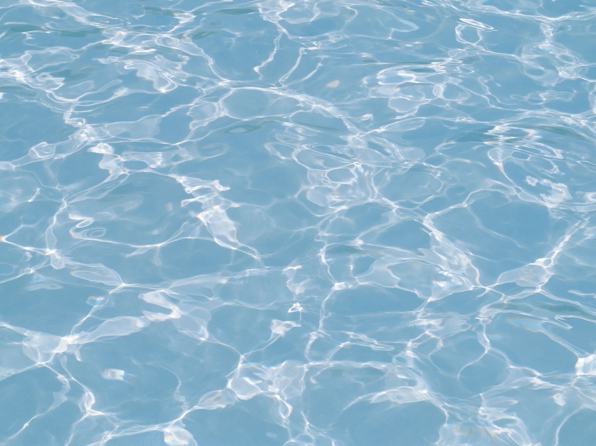Sunlit Water Ripples Photography Poster.